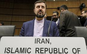 FILE - Ian's Ambassador to the International Atomic Energy Agency, IAEA, Kazem Gharibabadi, waits for the start of the IAEA board of governors meeting at the International Center in Vienna, Austria, Nov. 21, 2019. (AP Photo/Ronald Zak, File)