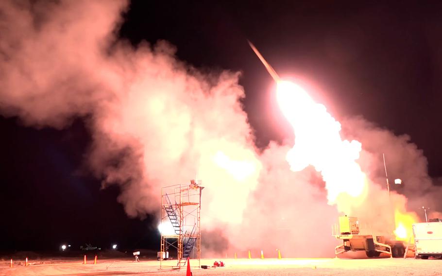 A missile is fired from a launcher.