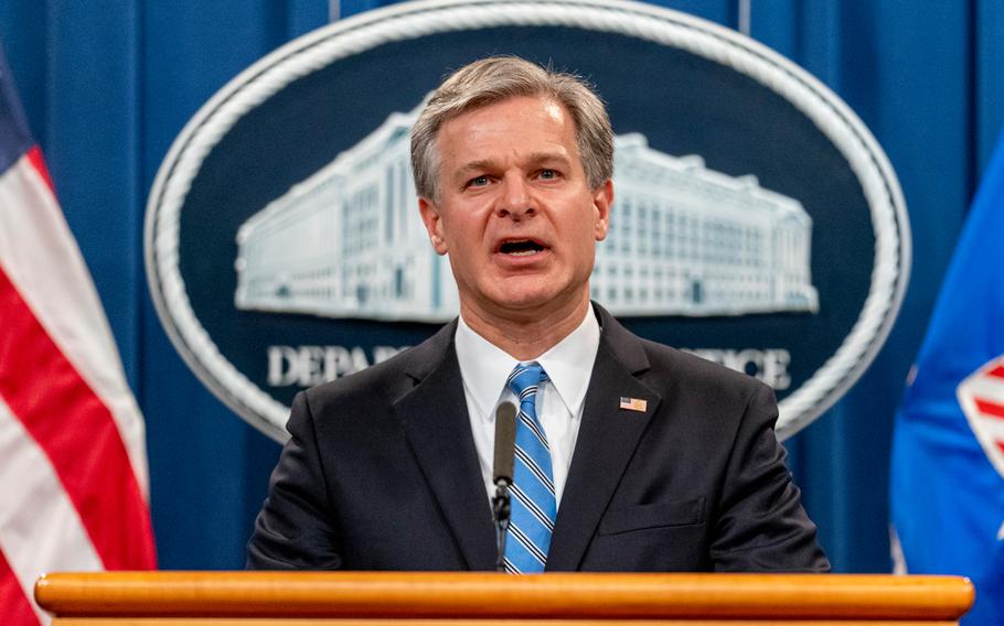 FBI Director Christopher Wray speaks at a news conference at the Justice Department in Washington, on Nov. 8, 2021. 