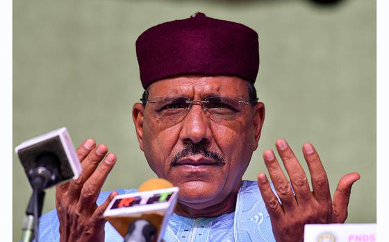 Niger's newly elected president Mohamed Bazoum gestures at his party headquarter after the announcement of his election in Niamey, on Feb. 23, 2021. (Issouf Sanogo/AFP/Getty Images/TNS)