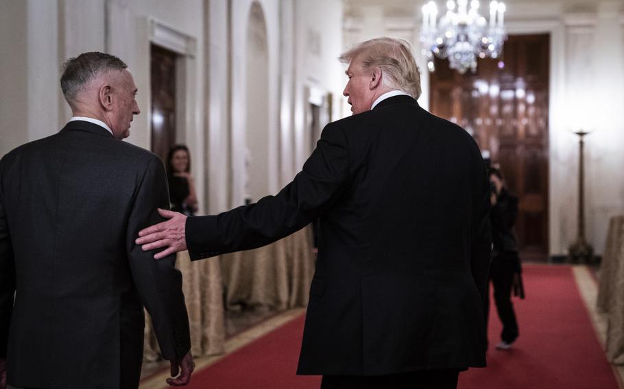 Jim Mattis and President Donald Trump talk after a White House reception in 2018. 