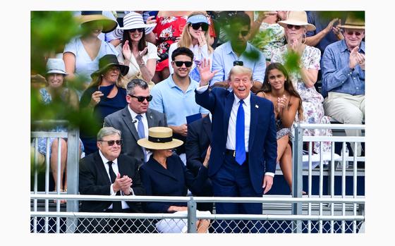 Former President Donald Trump waves as he attends the graduation ceremony of his son, Barron Trump, at Oxbridge Academy in Palm Beach, Florida, May 17, 2024. (Giorgio Viera/AFP/Getty Images/TNS)