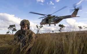 In this photo provided by the Australian Defense Force, soldiers from the 4th Regiment, Royal Australian Artillery and 3rd Battalion dismount from an MRH-90 Taipan during Exercise Chau Pha at Townsville Field Training Area, Townsville, Queensland, on June 12, 2023. The Australian army will never again fly its fleet of MRH-90 Taipan helicopters following a crash in July that killed four personnel, the defense minister said on Friday, Sept. 29, 2023.