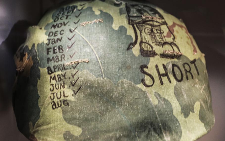 A helmet cover from Vietnam in 1968 at the National Museum of the United States Army on its reopening day, June 14, 2021.