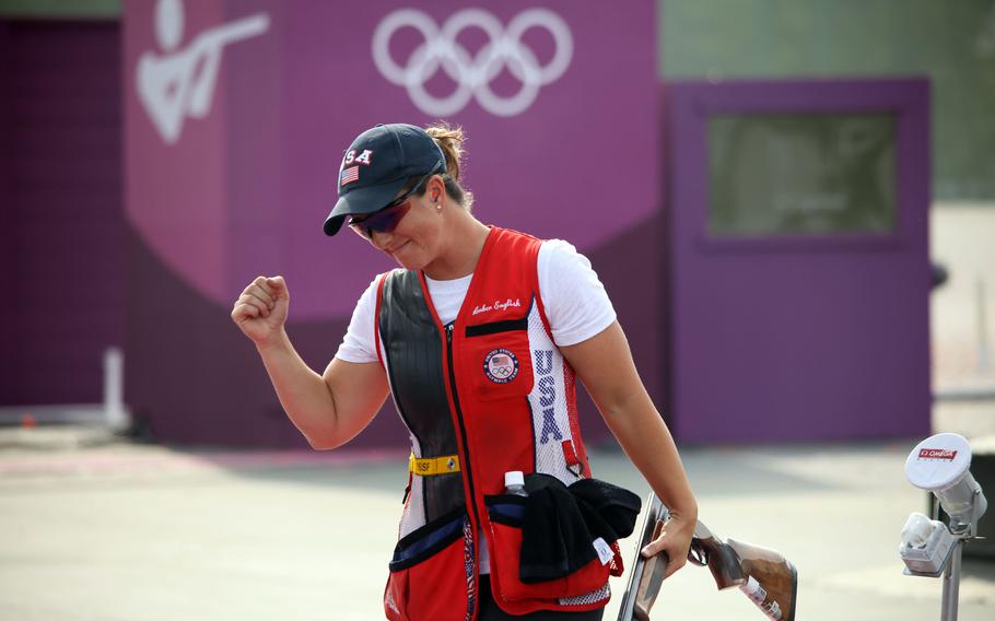 First Lt. Amber English, a logistics officer and member of the Army Marksmanship Unit, celebrates her gold-medal win in women’s shotgun skeet at Camp Asaka, Japan, Monday, July 26, 2021.