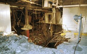 FILE - The crater in an underground parking garage from the World Trade Center explosion is shown in this Feb. 27, 1993 photo. New York City is marking the anniversary of the 1993 bombing that blew apart a van parked in an underground garage, killing six people and injured more than 1,000. The Port Authority of New York and New Jersey is holding a memorial Mass on Monday, Feb. 26, 2024 at St. Peter’s Church in Manhattan. (AP Photo/Richard Drew, file)