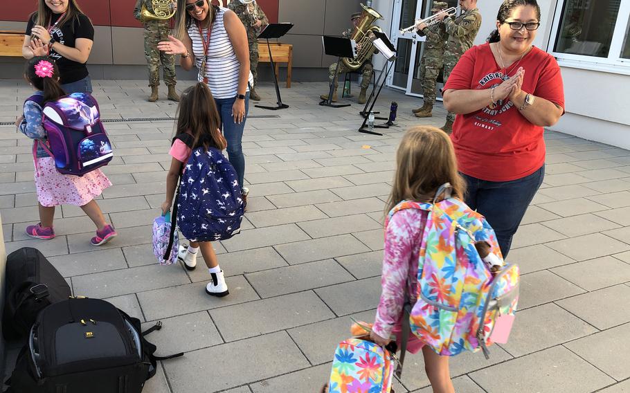 Kindergarten teachers at Kaiserslautern Elementary School in Kaiserslautern, Germany, greet new students on Monday, Aug. 22, 2022, the first day back to school for most Defense Department students in Europe and the Pacific.