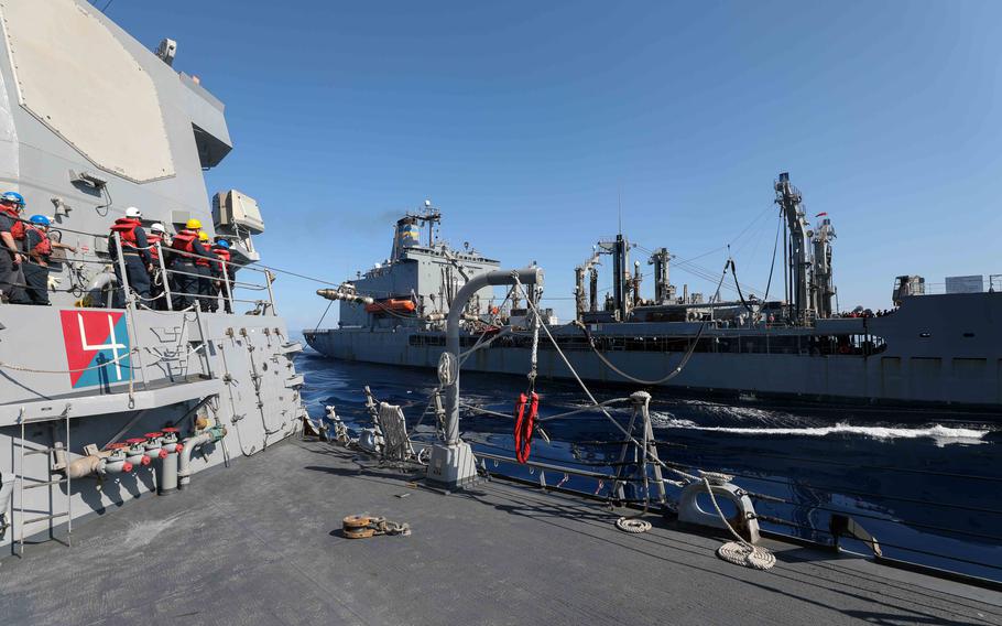 Sailors assigned to the destroyer USS Porter conduct replenishment-at-sea operations with the Henry J. Kaiser-class fleet replenishment oiler USNS Kanawha on Oct. 17, 2021. 