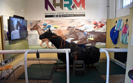 A mechanical horse that visitors can ride that emulates what it is like to be a jockey of a race horse, at the National Horse Racing Museum October 11, 2022. 