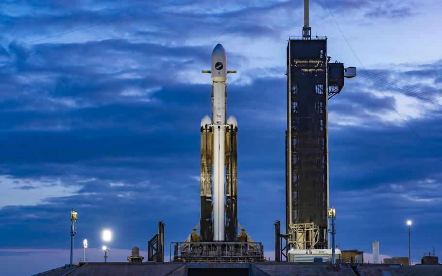 A SpaceX Falcon Heavy sits on Launch Pad 39-A at Kennedy Space Center ahead of the USSF-52 mission. 