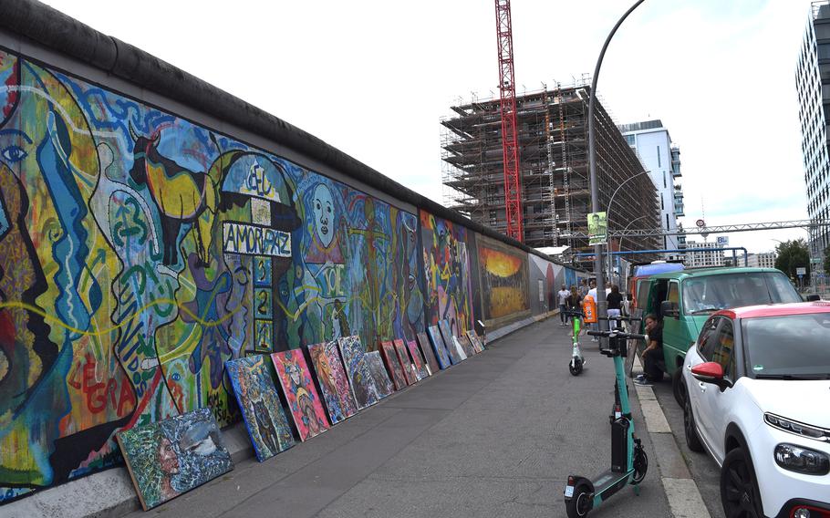 A high-rise construction project looming over the East Side Gallery, an open-air art exhibit created from the Wall’s longest intact stretch, highlights, to some, the relentless takeover of Berlin by global capitalism. 