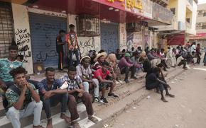 People stage a sit-in demanding a return to civilian rule and to protest the nine people who were killed in anti-military demonstrations last month, in Khartoum, Sudan, Monday, July 4, 2022. 