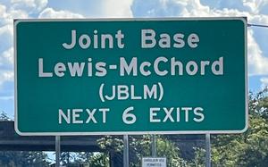An exit sign for Joint Base Lewis-McChord on Interstate 5 near Tacoma, Wash.