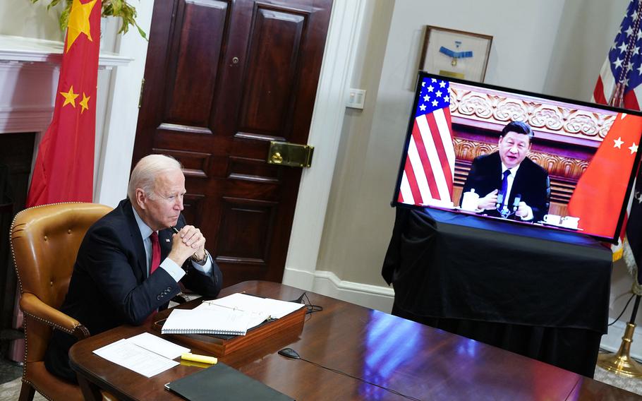 U.S. President Joe Biden meets with China's President Xi Jinping during a virtual summit from the Roosevelt Room of the White House in Washington, D.C., Nov. 15, 2021.