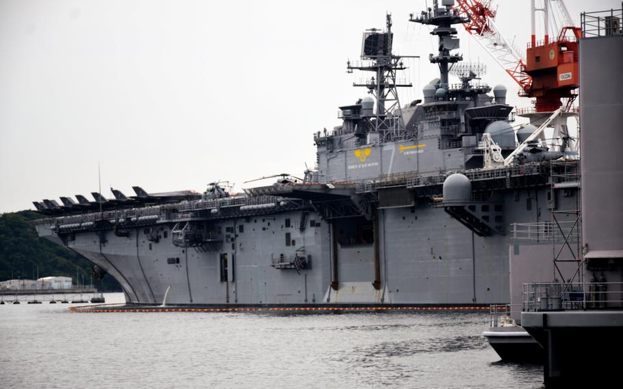 The amphibious assault ship USS Tripoli arrives at Yokosuka Naval Base, Japan, May 29, 2022, the second stop of its maiden deployment to the Indo-Pacific region. 
