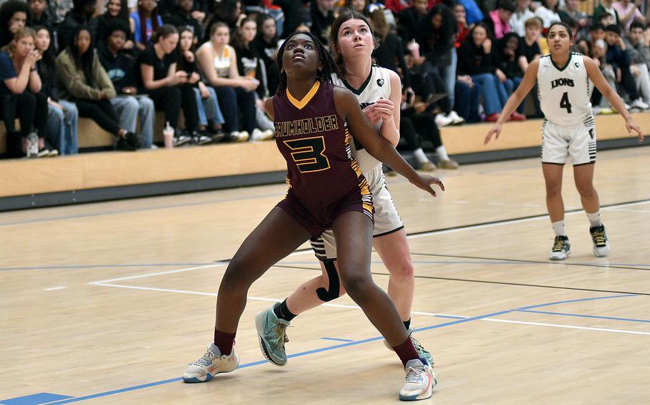 Baumholder’s Adabella Anku boxes out AFNORTH’s Finja Liebing during pool-play action of the DODEA European basketball championships on Feb. 14, 2024, at the Wiesbaden Sports and Fitness Center on Clay Kaserne in Wiesbaden, Germany.