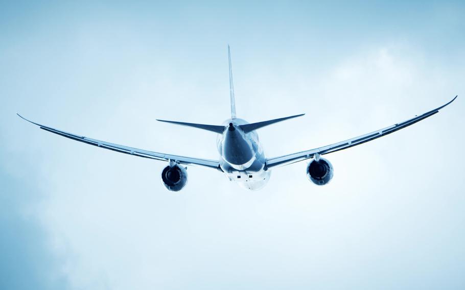 Commercial airplane flying in the sky