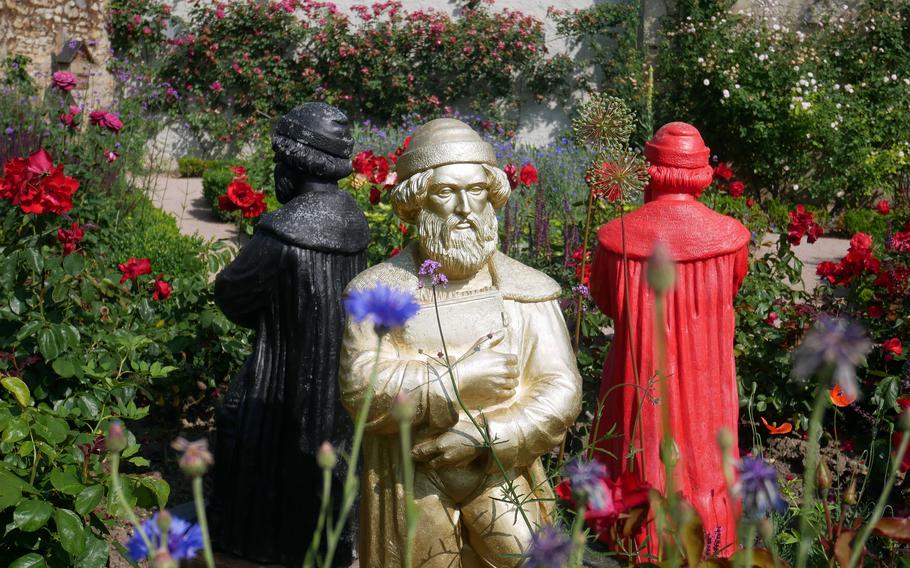 Statues of Johann Gutenberg stand in the castle garden in Eltville.