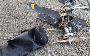 The wreckage of a drone is seen at Baghdad airport, Iraq, Monday, Jan. 3, 2022. Two armed drones were shot down at the Baghdad airport on Monday, a U.S.-led coalition official said, an attack that coincides with the anniversary of the 2020 U.S. killing of a top Iranian general. (International Coalition via AP)