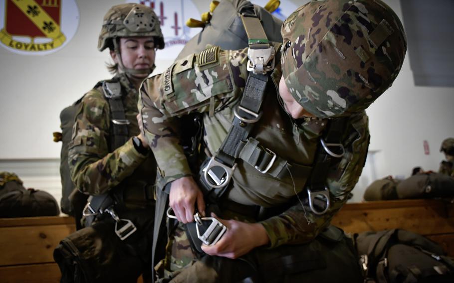 Spc. Olivia Alimanestiano has her chute checked prior to an all-female airborne operation March 14, 2024, by the 173rd Airborne Brigade near Vajont, Italy.