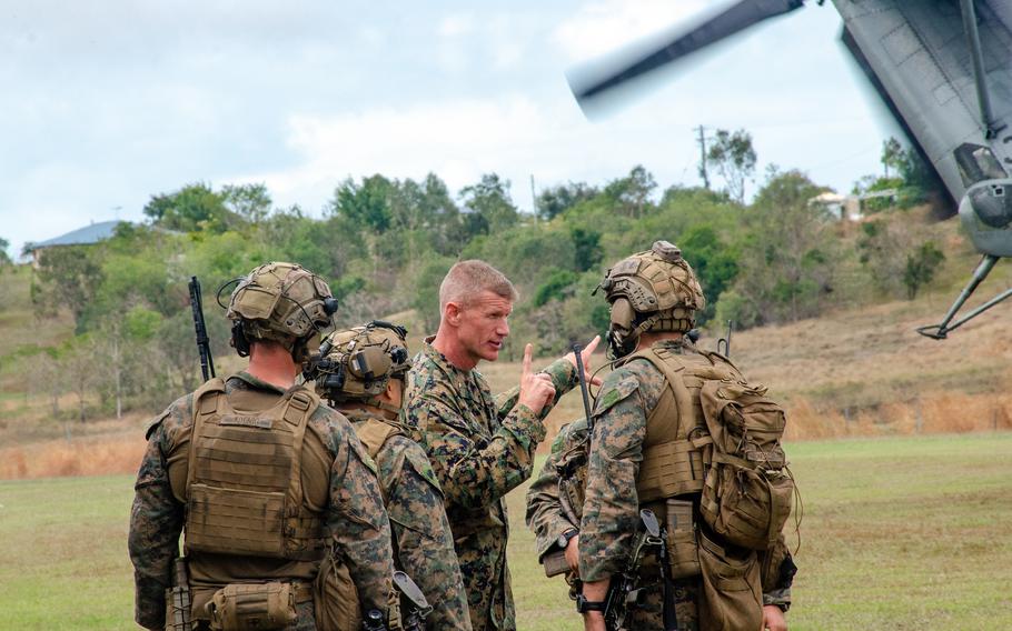 Brig. Gen. Kevin Jarrard, assistant commander of the 1st Marine Division, coaches his Marines during an uncontested air-assault exercise at Bloomsbury Airfield in Midge Point, Australia, Friday, June 28, 2023.