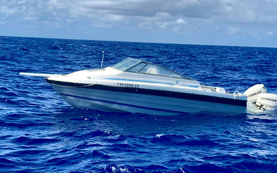 The Coast Guard led a search-and-rescue operation Saturday, Jan. 6, 2024, to save six Chinese nationals in distress after their boat, seen here, started taking on water near Guam. 