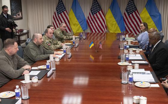 U.S. Defense Secretary Lloyd Austin (right) meets with Ukrainian Defense Minister Rustem Umerov (second left) at the Pentagon in Washington, D.C., on Wednesday, Dec. 6, 2023. (Roberto Schmidt/AFP/Getty Images/TNS)