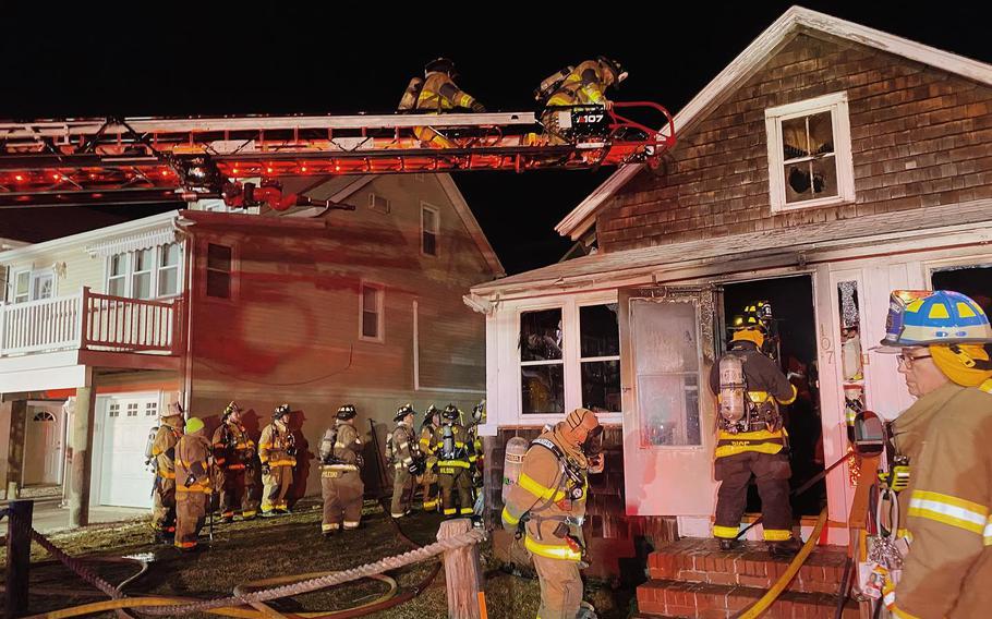 Firefighters at the scene of 94-year-old Paul Roberts’ home, shortly after putting out the flames. Roberts lost everything in the blaze and neighbors are currently raising funds to help him rebuild