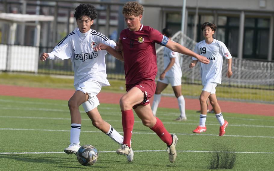 Diam Demarsico-Birkland tries to dribble.
