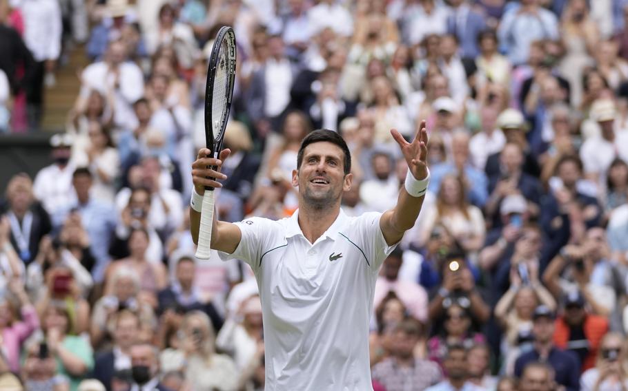 Serbia’s Novak Djokovic celebrates after winning the men’s singles final of the Wimbledon Tennis Championships in London, July 11, 2021. The Australian government has denied No. 1-ranked Novak Djokovic entry to defend his title in the year’s first tennis major and canceled his visa because he failed to meet the requirements for an exemption to the country’s COVID-19 vaccination rules.