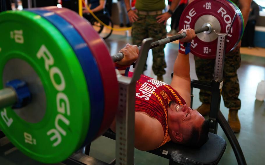 Marine veteran Raymond Cardoza successfully bench presses 287 pounds at the Marine Corps Trials on March 4, 2023, at Camp Pendleton.