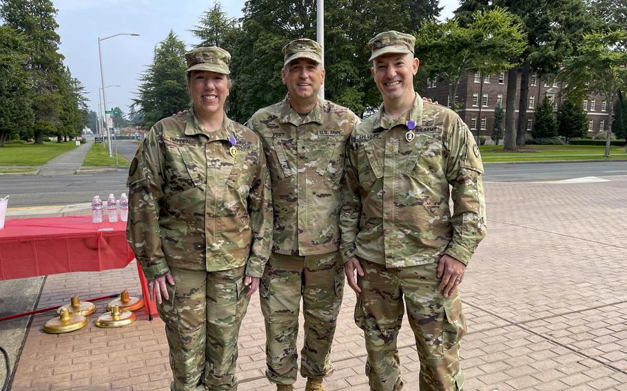 Army Sergeant Major Andrea Hayden (left) and retired Major Patrick Silvers (left) survived a missile attack on Al-Asad Air Force Base in Iraq at Joint Base Lewis-McChord, Washington, Sept. 11, 2022. right) received the Purple Heart.  2020. 