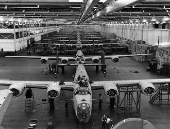 A line of B-24 Liberator bombers sits at the big Consolidated Aircraft Corp. plant at Willow Run, Michigan, circa 1943.