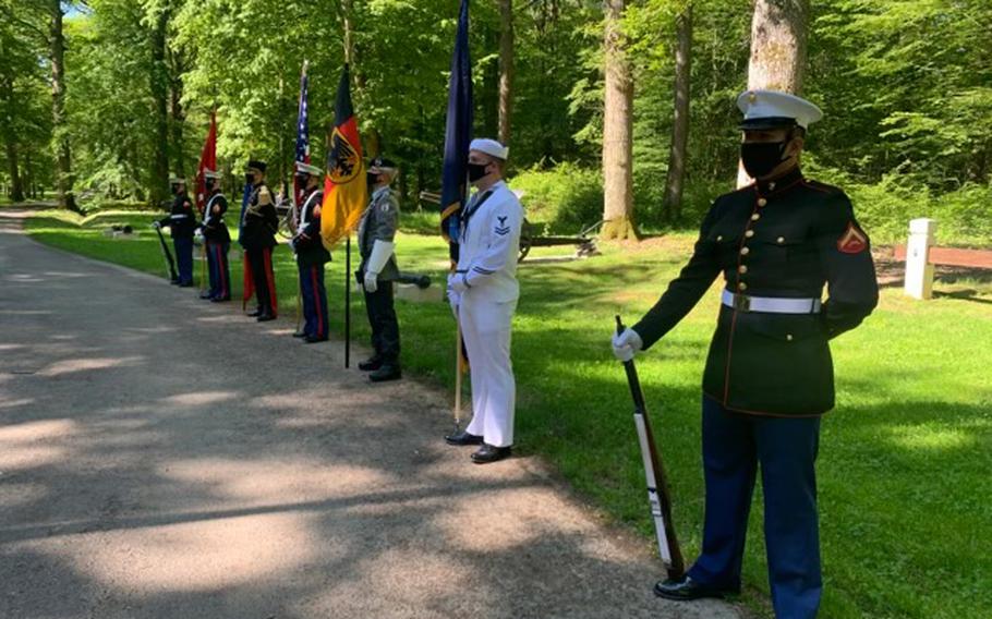 Lance Cpl. Carlos Rivera, a U.S. Marine Forces Europe and Africa administrative specialist, stands as part of the Color Guard for a memorial ceremony in Belleau Wood, France, on May 30, 2021.