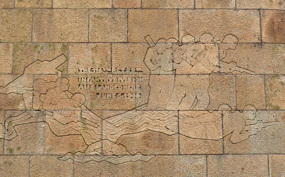 The dedication to the 116th Regimental Combat Team, 29th Infantry Division on one side of the Signal Monument at Saint-Laurent-sur-Mer on Omaha Beach. 