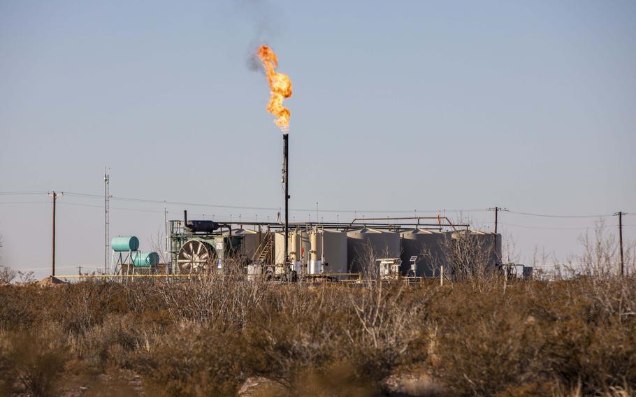 A flare burns off excess natural gas near Monahans, Texas, on Jan. 28, 2022. 