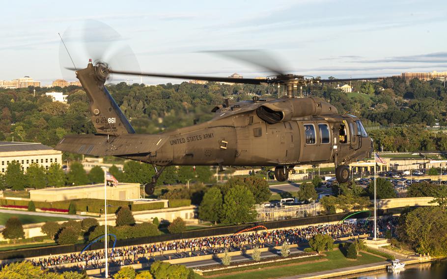 Four UH-60 Blackhawks assigned to the U.S. Army’s 12th Aviation Battalion perform a flyover.