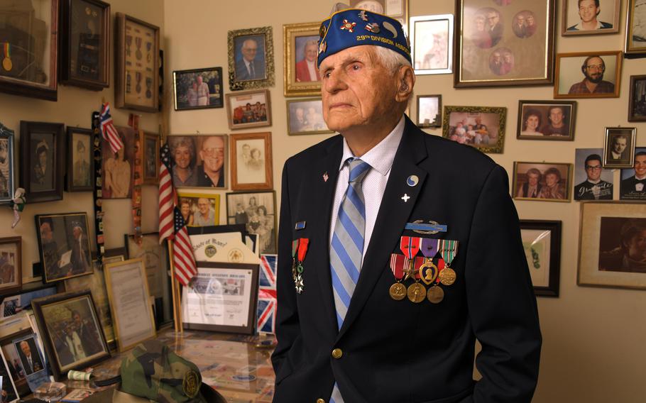 Steven Melnikoff, 102, a D-Day veteran, objects strongly to changing the blue-and-gray patch of the 29th Infantry Division. He wore the patch during the invasion of Normandy in 1944 and while fighting across France.