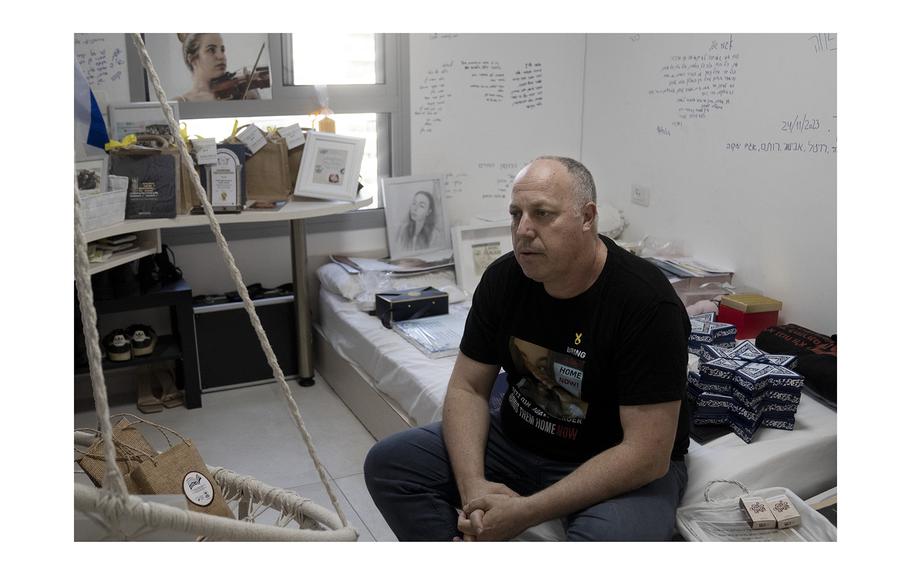 Shlomi Berger sits in his daughter’s bedroom in Holon, Israel, on April 17, 2024. Agam, 19, was abducted two days after the start of her army service along the border with Gaza during a cross-border attack by Hamas on Oct. 7, 2023. “The Passover story says we come from slaves to free people, so this is a parallel story,” Berger said. “This is the only thing I believe that will happen. That Agam will get out from darkness to light. She and all of the other hostages.” 