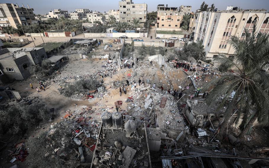 Palestinians inspect the damage to a family home in Rafah in southern Gaza this week.