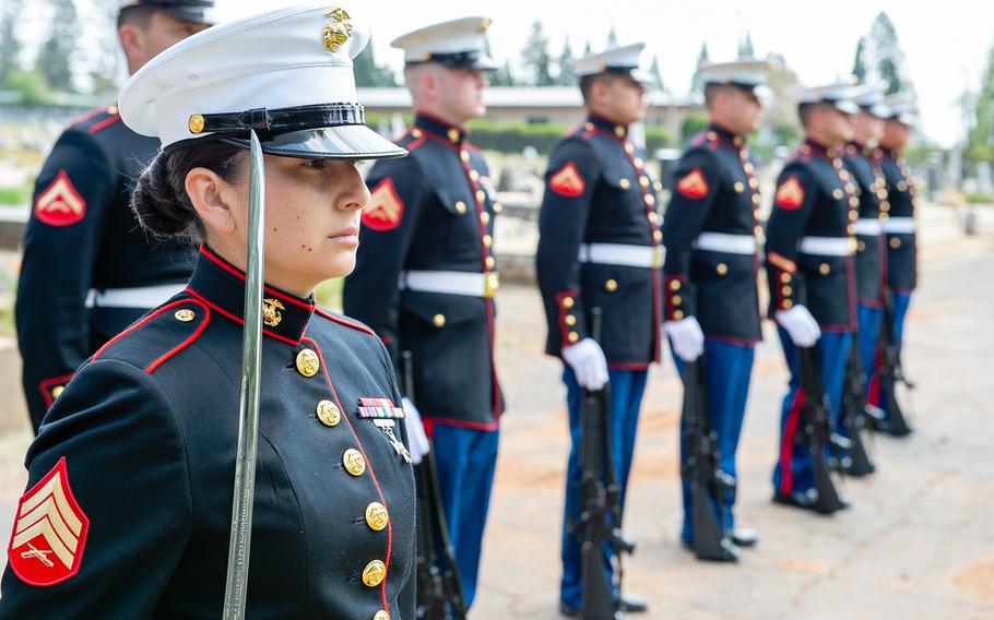 Sgt. Noemi Basaldua of Maintenance Service Company, Combat Logistics Battalion 23, leads a Marine Corps honor detail at retired Lt. Cmdr. Lou Conter’s memorial service.
