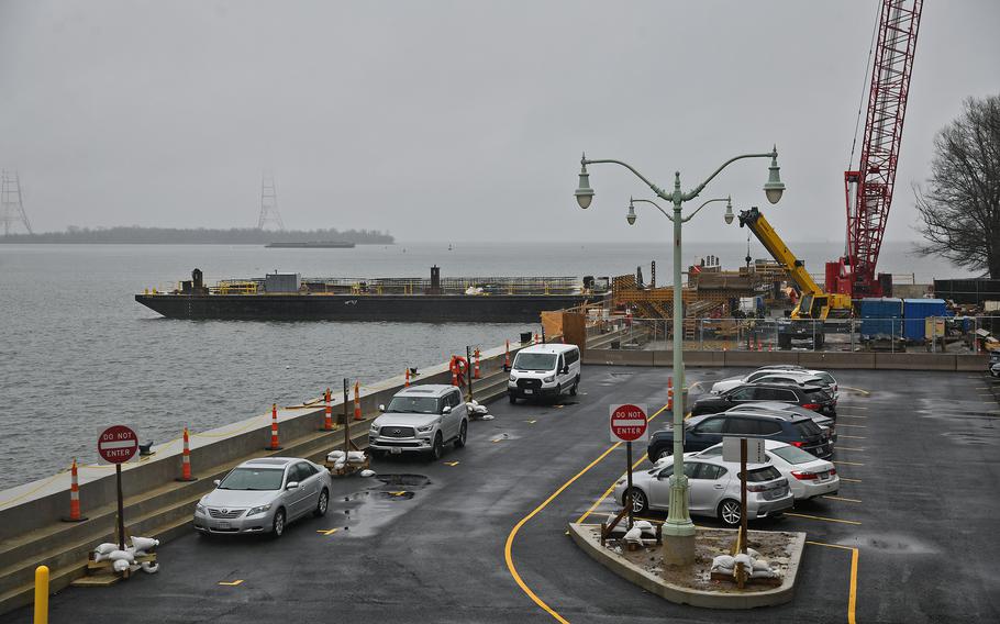 Construction continues of a new section of seawall at the Naval Academy. 