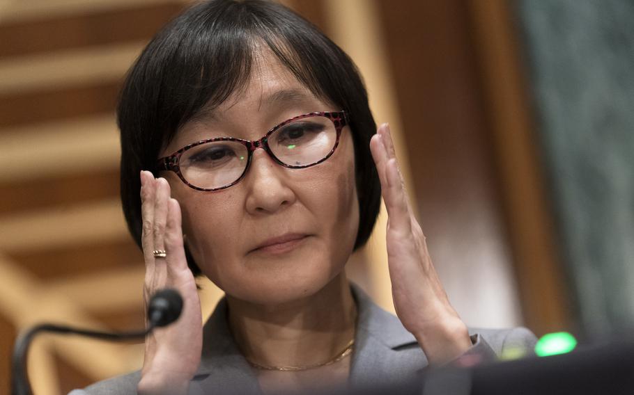 Saule Omarova of New York testifies before a Senate Banking, Housing, and Urban Affairs hearing on Capitol Hill in Washington to examine her nomination to be the Comptroller of the Currency, Thursday, Nov. 18, 2021.