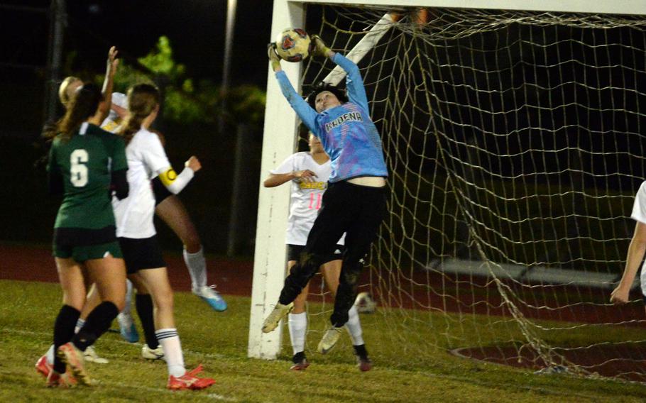 Kadena goalkeeper Cyla Donovan snares a Kubasaki corner kick during Wednesday's DODEA-Okinawa girls soccer match. The Dragons beat the Panthers 1-0 for the second time in two weeks.