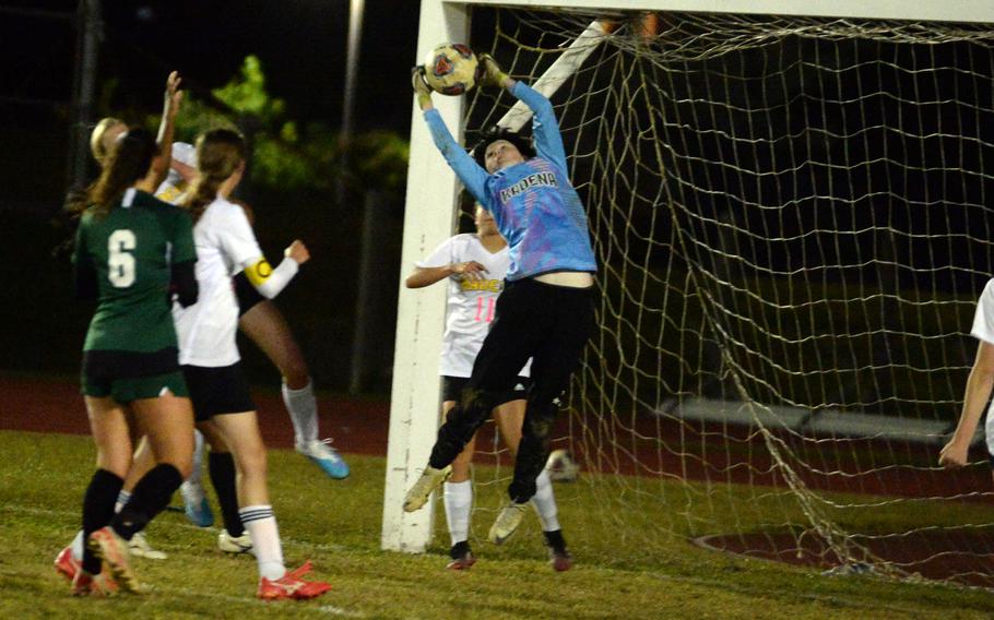 Kadena goalkeeper Cyla Donovan snares a Kubasaki corner kick during Wednesday's DODEA-Okinawa girls soccer match. The Dragons beat the Panthers 1-0 for the second time in two weeks.