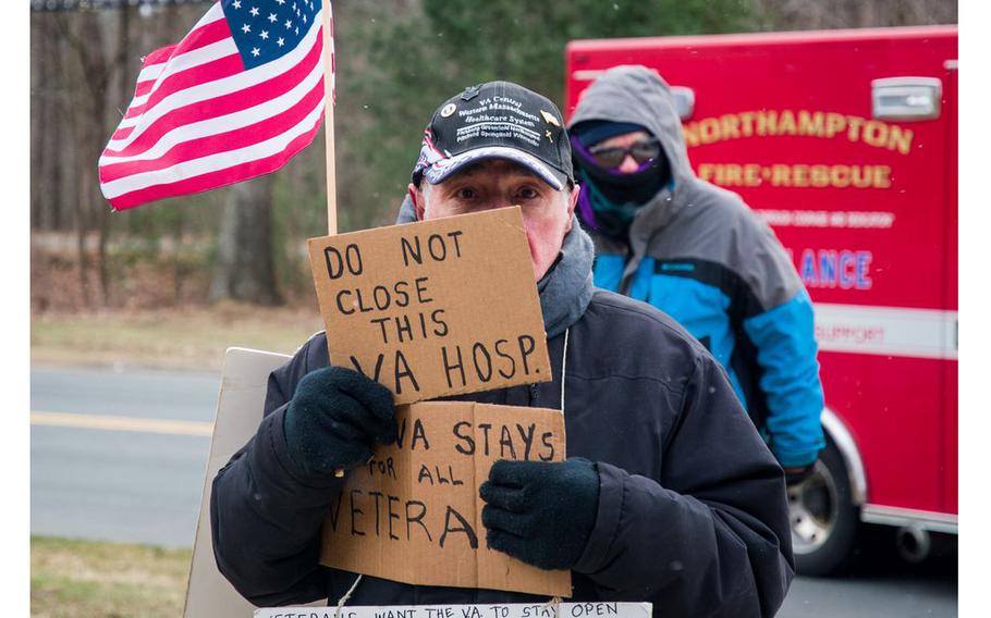 Dozens of elected officials, veterans and nurses turned out to protest the potential closure of a Veterans Affairs hospital in Northampton, Mass., on March 28, 2022.