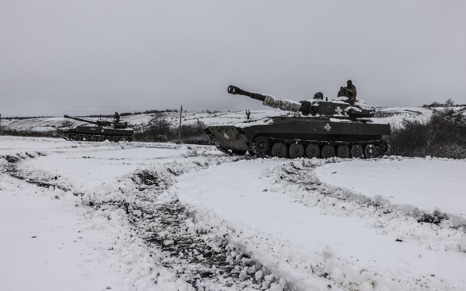 Ukrainian 2S1 Gvozdika howitzers move forward in Donetsk on Feb. 14, 2023.