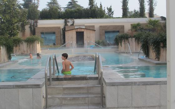 One of the six thermal pools at Hotel Mioni Pezzato in Abano Terme, Italy features a circular current. The building in the background contains saunas, steam rooms, and an ice-filled room called "Polaris."