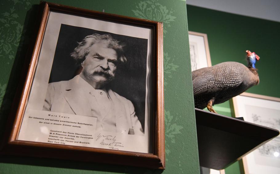 A photo of Mark Twain hangs inside the Langbein Museum, Hirschhorn, Germany, on July 8, 2023. Twain visited the town in 1878 and wrote about it in his book “A Tramp Abroad,” published in 1880.