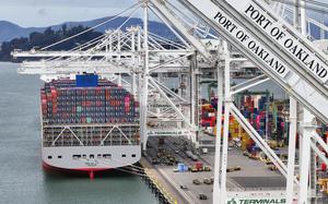 A ship loaded with containers in port.